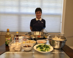 Tzu Chi volunteer Angela Wan leads an online vegetarian cooking class