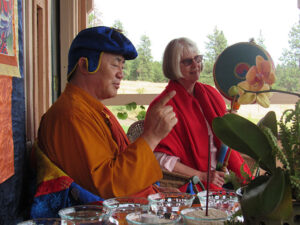Khenpo and Donna Selby offering a Chenrezig Buddha of Compassion fire ceremony in Baker City, Oregon