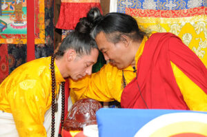 Anastasio receives blessings from Rinpoche at the end of the Dzogchen Summer Internship