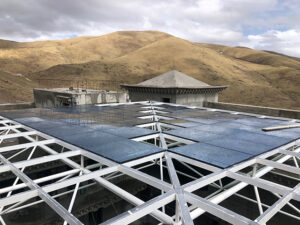 The solar panels, when complete, will protect the courtyard from the elements and warm it