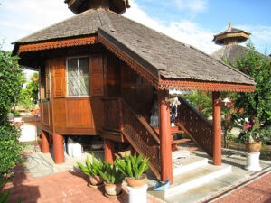The monastery will include huts for each monk, though likely less ornate than this one in Thailand