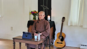 Brother Phap Con (Br. Gem) offering a dharma talk at Open Way Mindfulness Center during the Deer Park Monastery “Happiness is the Way” Road Retreat August 2021