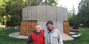 Peace Pagoda builders Denny Moore and Jim Lyman, rejoicing in completion of the second inner cylinder of the rising pagoda