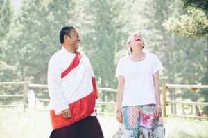 Tulku Sangak Rinpoche and Lama Tsomo share a laugh during a translation team retreat