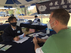 Tzu Chi Seattle volunteers distribute relief supplies to eastern Washington residents of Pine City and Malden, two towns hit by the Babb Road wildfire