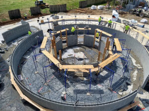 Concrete blocks form the round walls while giving strength and durability