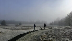 Students walk to the dining hall on a frosty morning