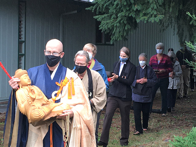 Abbot Koshin Chris Cain leads the Puget Sound Center Sangha into their new meditation hall during the October blessing ceremony