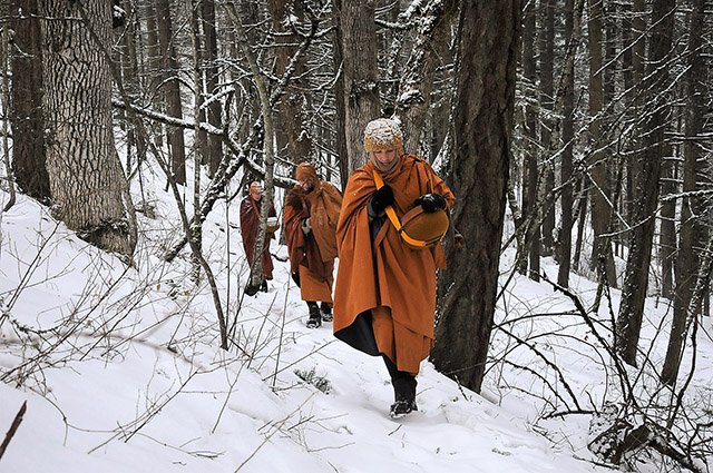Pacific Hermitage monks, here led by Ajahn Sudanto, sometimes walk through heavy snow