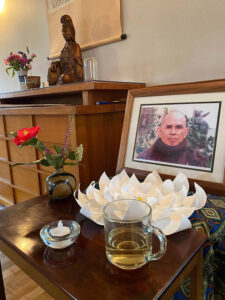 An altar for Thay at Dharma Gate Seattle, with a respectful cup of tea, honoring the seven-day ceremony of his transition