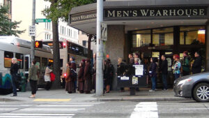 A walking-meditation “flash mob” in downtown Seattle, conducted by “Wake Up,” included people 18 to 35