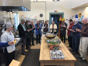Meal prayer in the central kitchen