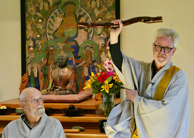 Zen Master Ji Bong witnesses Dharma transmission to Jeong Bong, with  stick