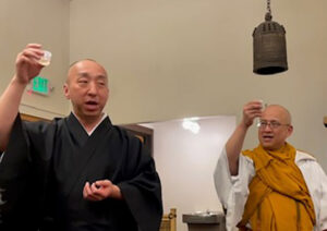 Seattle Betsuin Minister Kusunoki, and Koyasan Minister Taijo Imanaka, toast with sweet tea after leading a joint Hanamatsuri service at Koyasan Temple