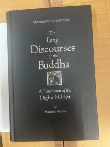 One of the India-printed versions of the Long Discourses of the Buddha, with a foil-stamped title.