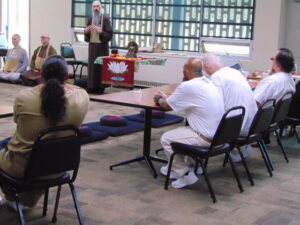 Inmates listen to Fa Hsing giving a dharma talk.Photos by: A prison inmate, who must remain unnamed