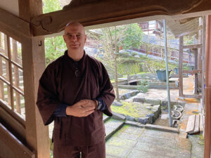 Nomon Tim Burnett in the hallways of Eihei-ji Monastery, the head training temple of Soto Zen