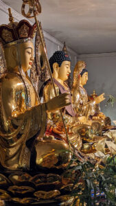 A few of the many Buddhas at the Mia Chung Temple altar