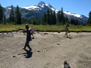 Sangha members practice Taiji, also know as Tai Chi, at Mt. Jefferson, Oregon’s second highest mountain