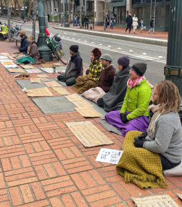 The sangha also meditated in downtown Portland for the 2024 “Buy  Nothing Day”