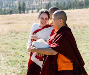 Jetsünma and Lama Chönyi socializing at an event at the Namchak Retreat Ranch