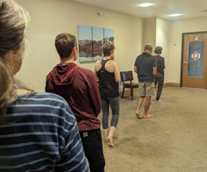 Members of the Bozeman Zen Group practice walking meditation at a retreat in July 2023