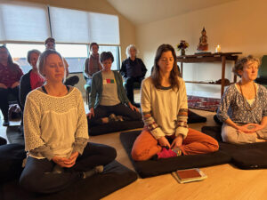 Kaytlin Begley, Allison Howe, CarolRae Cambianica, Marilyn Raffensperger, Catherine Cussaguet, Wendy Roberts and newcomers, enjoy the first mahasangha half-day sit in December, 2023