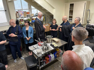 Members of No-Rank Zen Temple become acquainted with the newly renovated kitchen, at the beginning of the first summer sesshin in the building