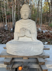 This stone Buddha will gaze over the peace pagoda area