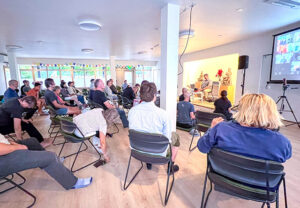 Tim Geil leading a meditation and talk on a Monday evening