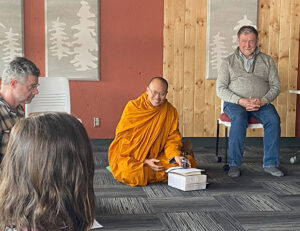 Visiting Thai monk Phra Panot speaking to the Whitehorse sangha, in March, 2025