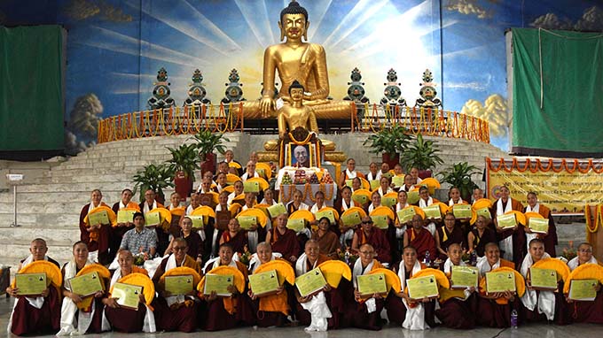 The 47 new geshemas, at their November graduation ceremony in Bodh Gaya, India