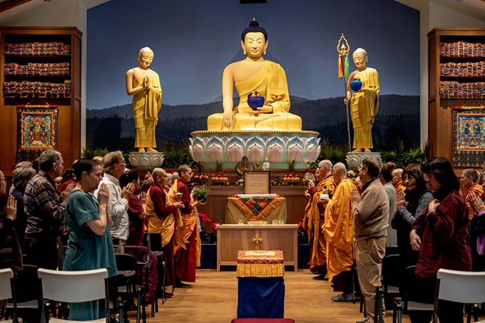 The Buddha Hall features a central statue of the Buddha, plus one of his attendant Ananda, and one of Mahaprajapati, the first nun.