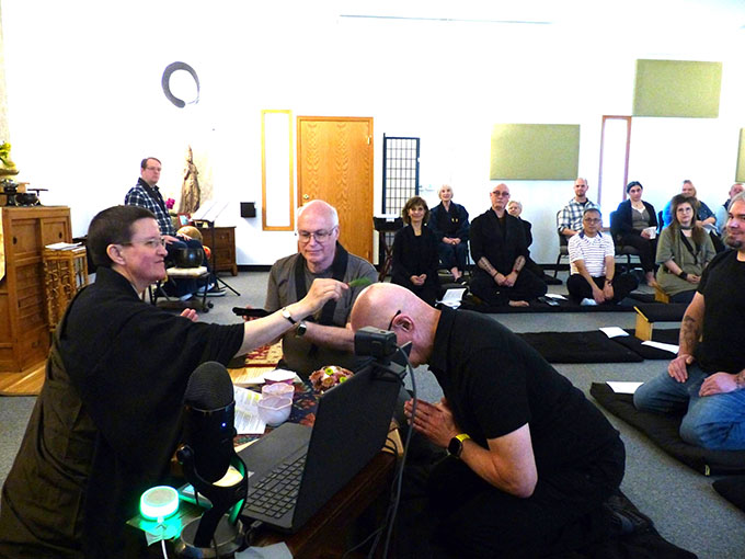 Domyo leads a jukai ceremony, during which someone takes formal precepts.
